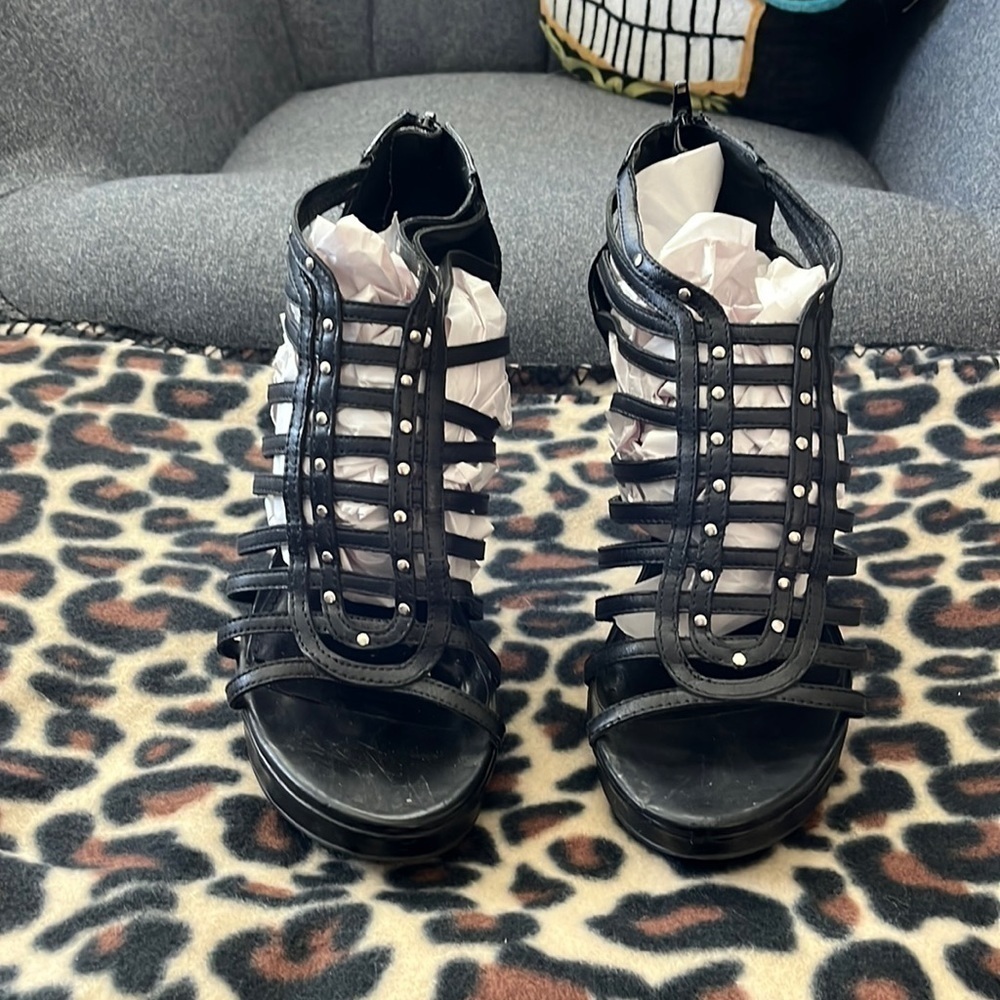 Franco Sarto black leather heeled studded shoe size 8 1/2. Wear on the heels.